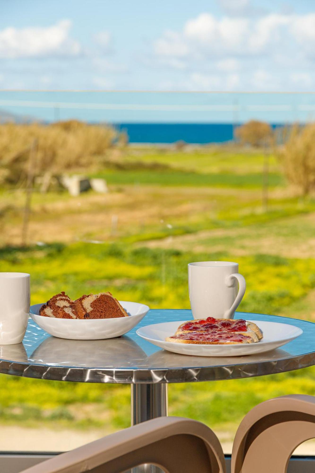 Achatis Apartments With Sea View Колимварион Экстерьер фото